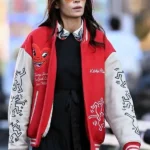 Keith-Haring-Heart-Face-New-York-City-2026-Famke-Janssen-Red-Varsity-Jacket
