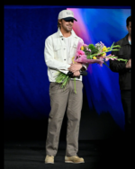 Ryan-Gosling-White-Jacket-CinemaCon.webp