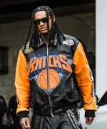 Recreated-Jordan-Clarkson-NBA-Finals-2026-Who-Decides-War-x-New-York-Knicks-Championship-Statue-of-Liberty-Back-Graphic-Black-Orange-Leather-Jacket.webp