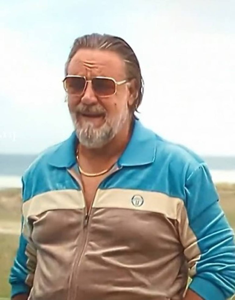 The-Get-Out-2026-Russell-Crowe-Blue-Tracksuit-1