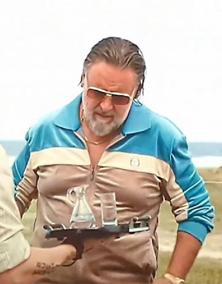 The-Get-Out-2026-Russell-Crowe-Blue-Tracksuit-3