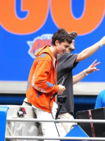 Timothee-Chalamet-NY-Knicks-Championship-Parade-Orange-Hoodie.webp