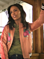 Zoeys-Extraordinary-Playlist-S01-Singing-Woman-Tropical-Jacket.webp