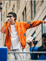 timothee-chalamet-nba-championship-knicks-parade-orange-hoodie-2026.webp