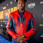 Dominique-Barrett-Red-and-Blue-Leather-Jacket-with-erect-collar-and-YKK-zipper-closure