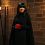Claudia-Winkleman-The-Celebrity-Traitors-Black-Coat