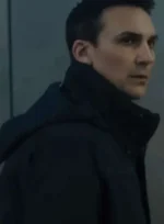 disclosure-day-2026-agent-diaz-black-jacket-man